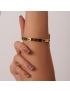 Emerald Glimmer Gold Bangle